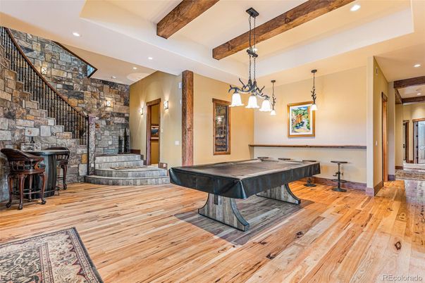 Billiard Table, Game Room, Interior, Pendant Lights, Recessed Lighting, Stone Walls, Wooden Beams, Wood Texture Flooring
