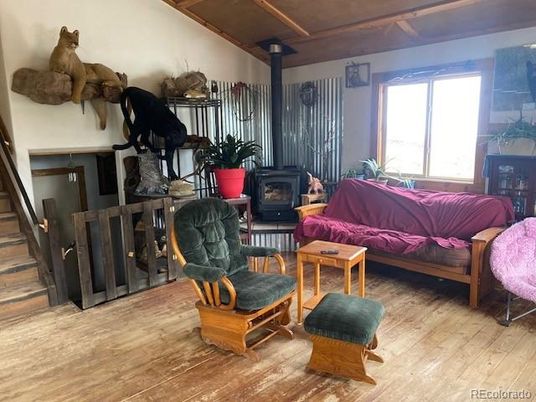 Bedroom, Fireplace, Fitness Equipment, Interior, Wood Texture Flooring