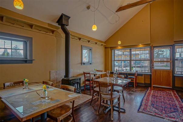 Dining room, Fireplace, Interior, Pendant Lights, Wooden Beams, Wood Texture Flooring