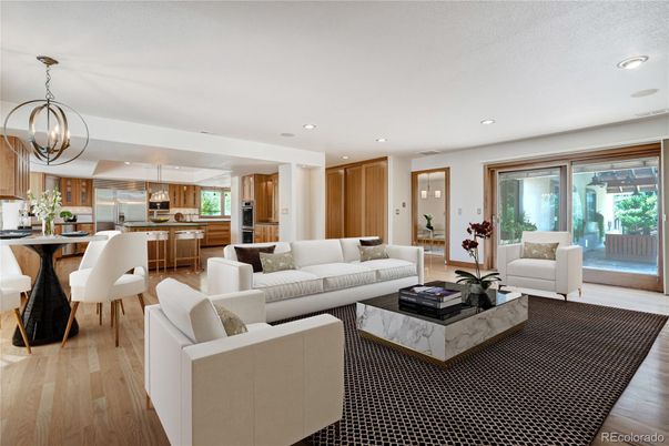 Chandelier, Dining room, Interior, Kitchen, Living room, Pendant Lights, Recessed Lighting, Stainless Steel Appliances, Wood Texture Flooring