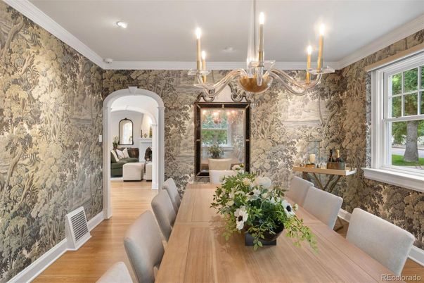 Chandelier, Dining room, Fireplace, Interior, Recessed Lighting, Stone Walls, Wood Texture Flooring