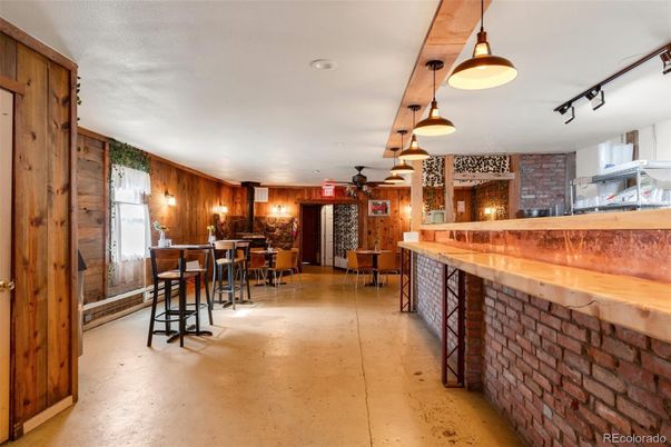 Dining room, Fireplace, Interior, Pendant Lights, Recessed Lighting, Stone Walls, Wooden Walls