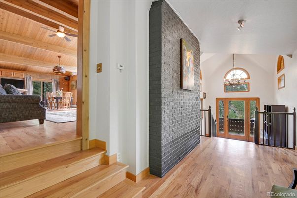 Chandelier, Dining room, Fireplace, Interior, Wooden Beams, Wooden Ceilings, Wood Texture Flooring