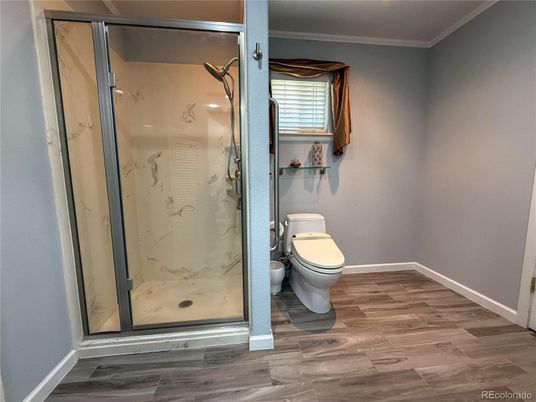 Bathroom, Glass Shower, Interior, Marble Walls, Wood Texture Flooring