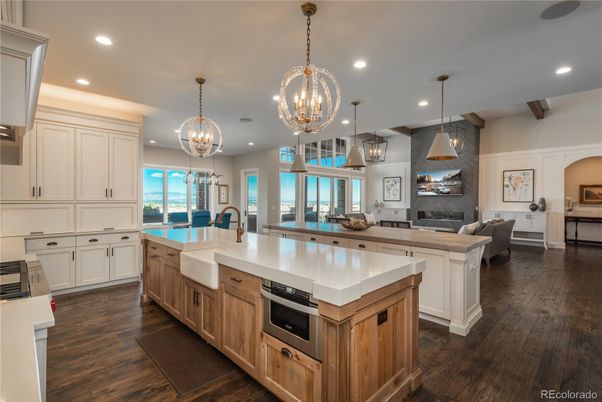 Chandelier, Interior, Kitchen, Living room, Pendant Lights, Recessed Lighting, Stainless Steel Appliances, Wood Texture Flooring