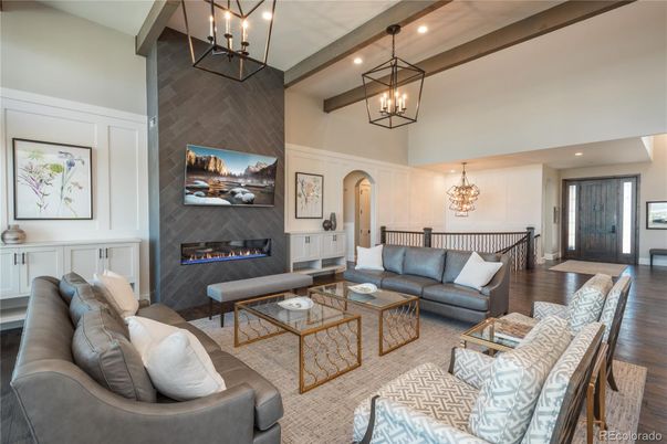 Chandelier, Fireplace, Interior, Living room, Pendant Lights, Recessed Lighting, Wood Texture Flooring