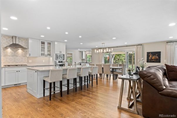 Dining room, Interior, Kitchen, Pendant Lights, Recessed Lighting, Stainless Steel Appliances, Wood Texture Flooring