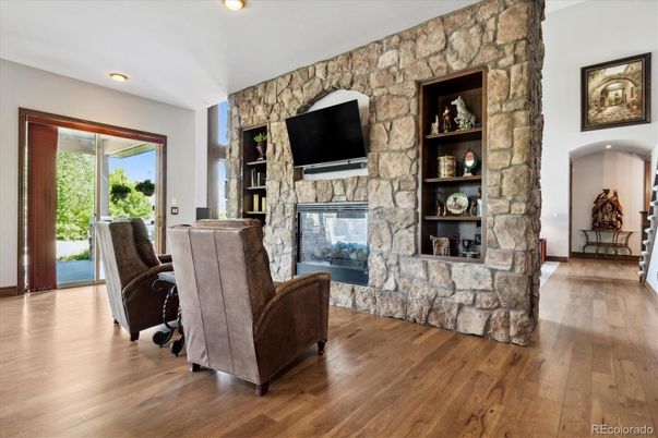Fireplace, Interior, Recessed Lighting, Stone Walls, Wood Texture Flooring