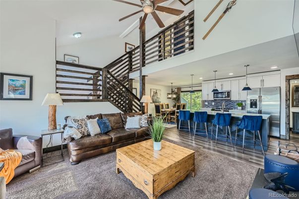 Dining room, Interior, Kitchen, Living room, Pendant Lights, Recessed Lighting, Stainless Steel Appliances, Wood Texture Flooring