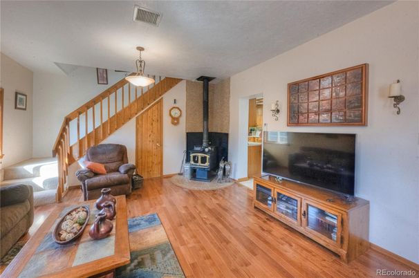 Fireplace, Interior, Living room, Pendant Lights, Wood Texture Flooring