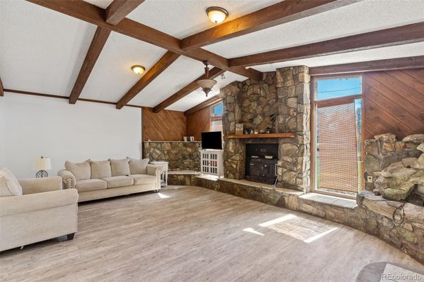 Fireplace, Interior, Living room, Stone Walls, Wooden Beams, Wood Texture Flooring