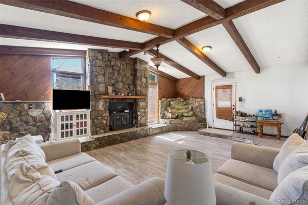 Fireplace, Interior, Living room, Stone Walls, Wooden Beams, Wood Texture Flooring