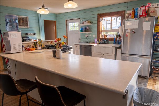 Interior, Kitchen, Pendant Lights, Stainless Steel Appliances, Wood Texture Flooring