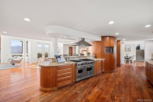 Dining room, Interior, Kitchen, Recessed Lighting, Stainless Steel Appliances, Wood Texture Flooring