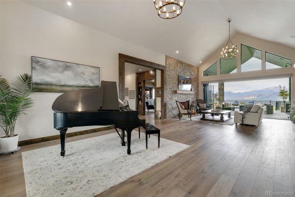 Interior, Living room, Piano, Recessed Lighting, Stone Walls, Wood Texture Flooring