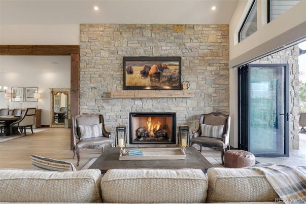 Fireplace, Interior, Living room, Piano, Recessed Lighting, Stone Walls, Wood Texture Flooring