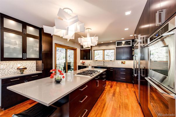 Chandelier, Interior, Kitchen, Recessed Lighting, Stainless Steel Appliances, Wood Texture Flooring