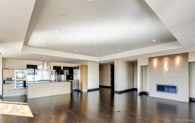 Fireplace, Interior, Kitchen, Pendant Lights, Recessed Lighting, Stainless Steel Appliances, Wood Texture Flooring