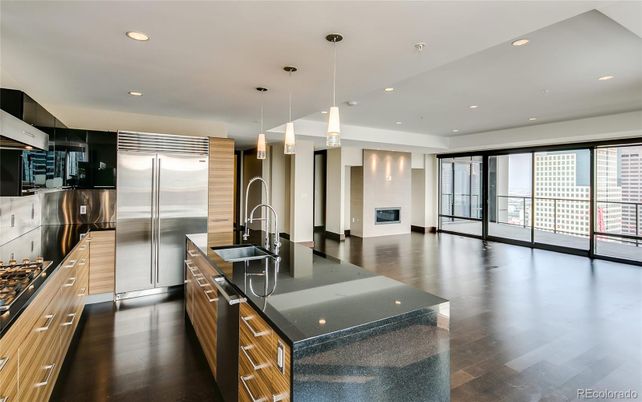 Fireplace, Interior, Kitchen, Pendant Lights, Recessed Lighting, Stainless Steel Appliances, Wood Texture Flooring