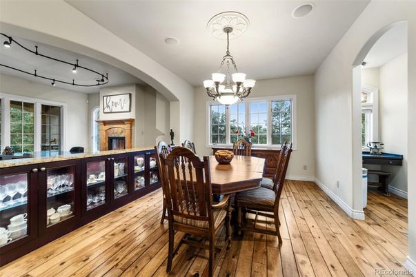 Chandelier, Dining room, Fireplace, Interior, Wood Texture Flooring