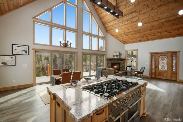 Chandelier, Dining room, Fireplace, Interior, Kitchen, Living room, Recessed Lighting, Wooden Beams, Wooden Ceilings, Wood Texture Flooring