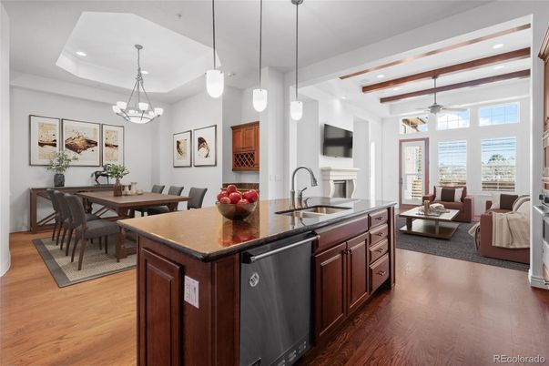 Chandelier, Dining room, Fireplace, Interior, Kitchen, Living room, Pendant Lights, Recessed Lighting, Wood Texture Flooring