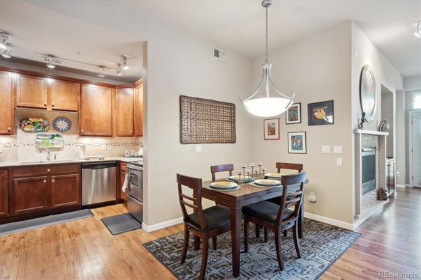 Dining room, Interior, Kitchen, Pendant Lights, Stainless Steel Appliances, Wood Texture Flooring