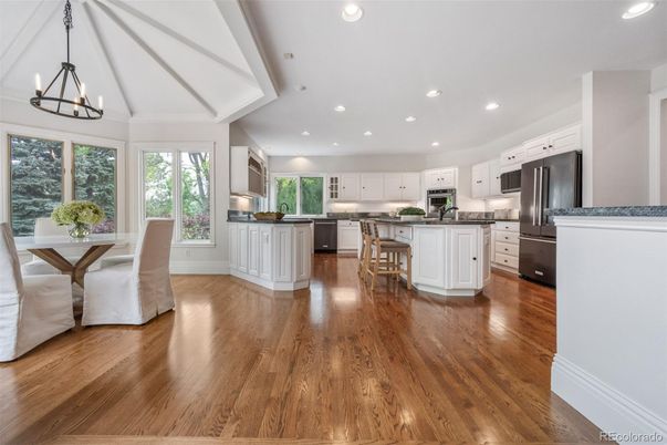 Chandelier, Dining room, Interior, Kitchen, Pendant Lights, Recessed Lighting, Stainless Steel Appliances, Wood Texture Flooring