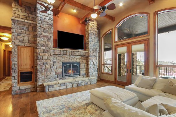 Fireplace, Interior, Living room, Recessed Lighting, Stone Walls, Wooden Beams, Wood Texture Flooring
