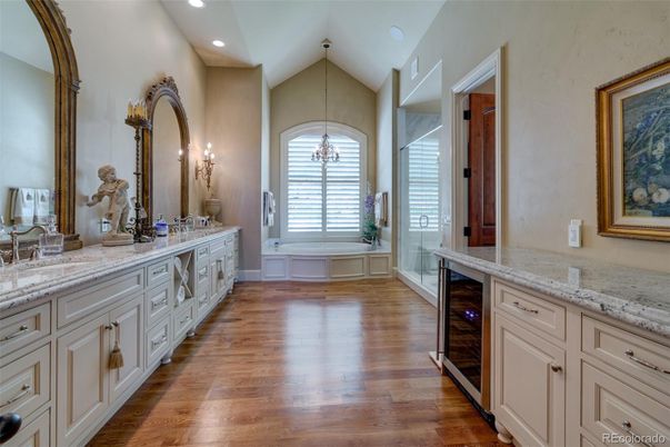 Bathroom, Chandelier, Dual Sink Vanities, Interior, Recessed Lighting, Wood Texture Flooring