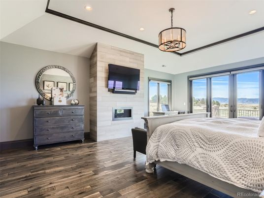 Bedroom, Fireplace, Interior, Pendant Lights, Recessed Lighting, Wood Texture Flooring
