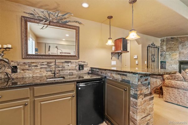 Fireplace, Interior, Kitchen, Pendant Lights, Recessed Lighting, Stone Walls