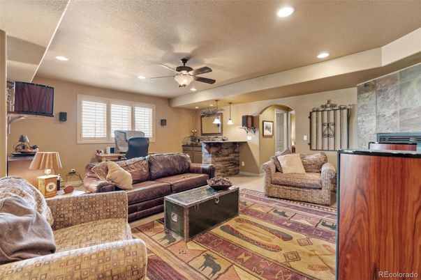 Fireplace, Interior, Living room, Pendant Lights, Recessed Lighting, Stone Walls