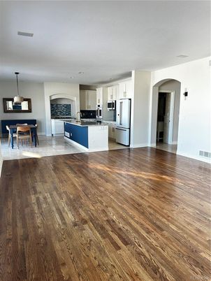 Dining room, Fireplace, Interior, Kitchen, Pendant Lights, Wood Texture Flooring