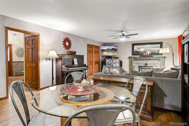Dining room, Fireplace, Interior, Living room, Piano, Wood Texture Flooring