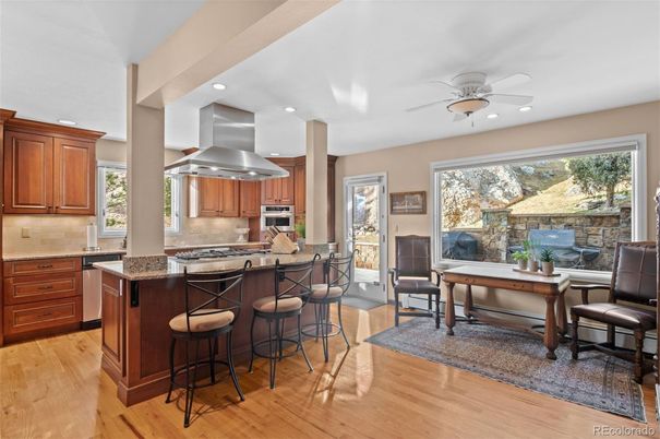 Dining room, Interior, Kitchen, Recessed Lighting, Stainless Steel Appliances, Wood Texture Flooring