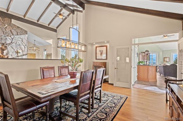 Chandelier, Dining room, Interior, Pendant Lights, Recessed Lighting, Stone Walls, Wooden Beams, Wood Texture Flooring