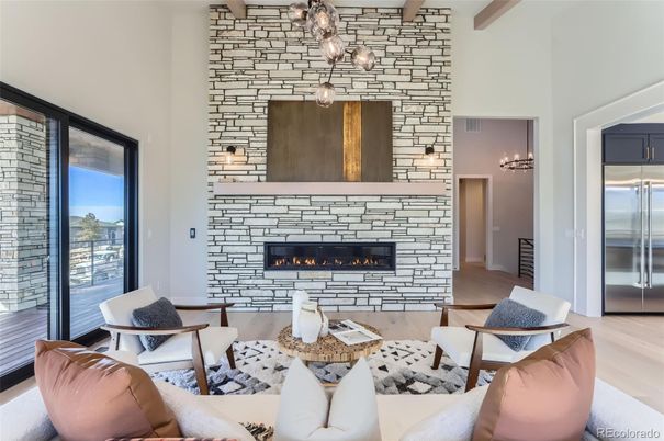Fireplace, Interior, Kitchen, Living room, Pendant Lights, Stainless Steel Appliances, Stone Walls, Wood Texture Flooring