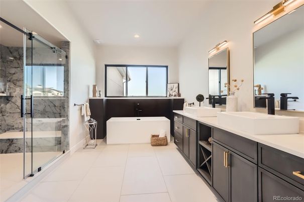 Bathroom, Dual Sink Vanities, Free Standing Baths, Glass Shower, Interior, Marble Walls, Recessed Lighting