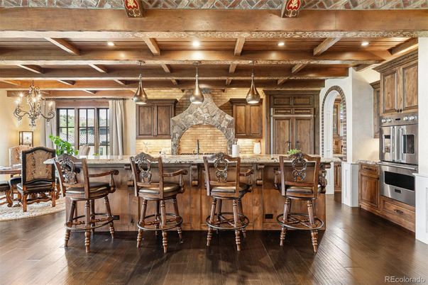 Chandelier, Dining room, Interior, Kitchen, Pendant Lights, Stainless Steel Appliances, Wooden Beams, Wooden Ceilings, Wood Texture Flooring