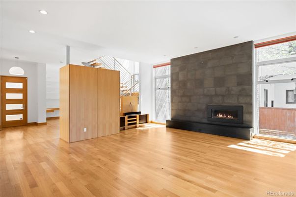 Fireplace, Interior, Pendant Lights, Recessed Lighting, Wood Texture Flooring