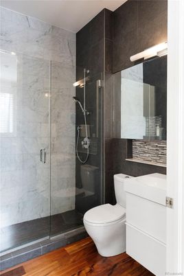 Bathroom, Glass Shower, Interior, Marble Walls, Wood Texture Flooring