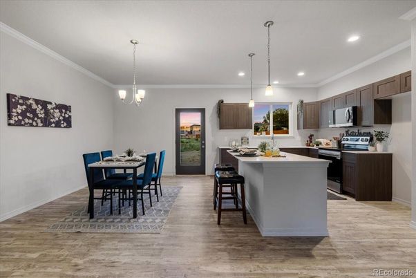Dining room, Interior, Kitchen, Pendant Lights, Recessed Lighting, Stainless Steel Appliances, Wood Texture Flooring