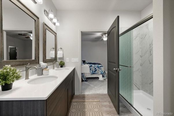Bathroom, Bedroom, Dual Sink Vanities, Glass Shower, Interior, Marble Walls, Wood Texture Flooring