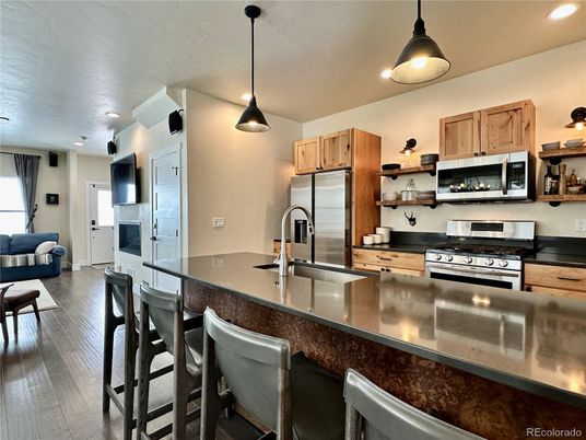Interior, Kitchen, Pendant Lights, Recessed Lighting, Stainless Steel Appliances, Wood Texture Flooring