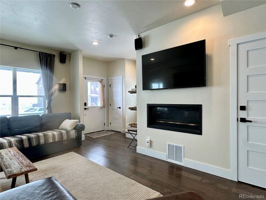 Fireplace, Interior, Living room, Recessed Lighting, Wood Texture Flooring