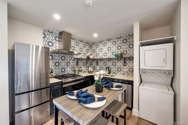 Interior, Kitchen, Recessed Lighting, Stainless Steel Appliances, Washer, Wood Texture Flooring