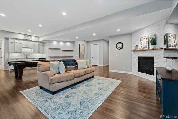 Billiard Table, Fireplace, Game Room, Interior, Kitchen, Living room, Recessed Lighting, Wood Texture Flooring