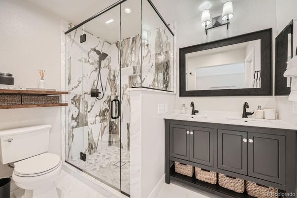 Bathroom, Dual Sink Vanities, Glass Shower, Interior, Marble, Marble Walls, Recessed Lighting