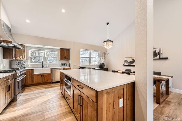 Chandelier, Interior, Kitchen, Pendant Lights, Recessed Lighting, Stainless Steel Appliances, Wood Texture Flooring
